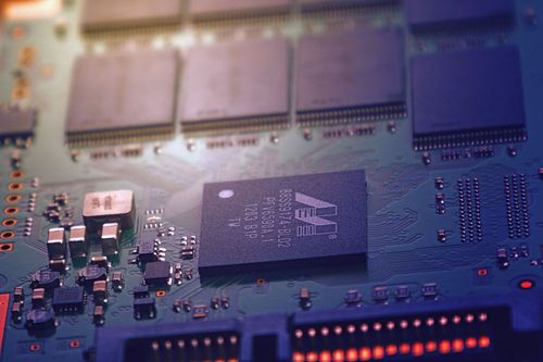 Close-up of a circuit board representing electronics and EV components