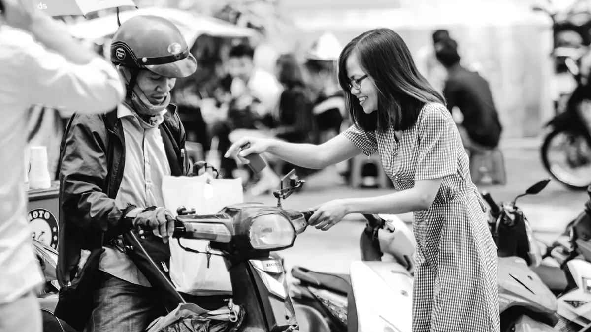 A courier delivers a parcel in Ho Chi Minh City.