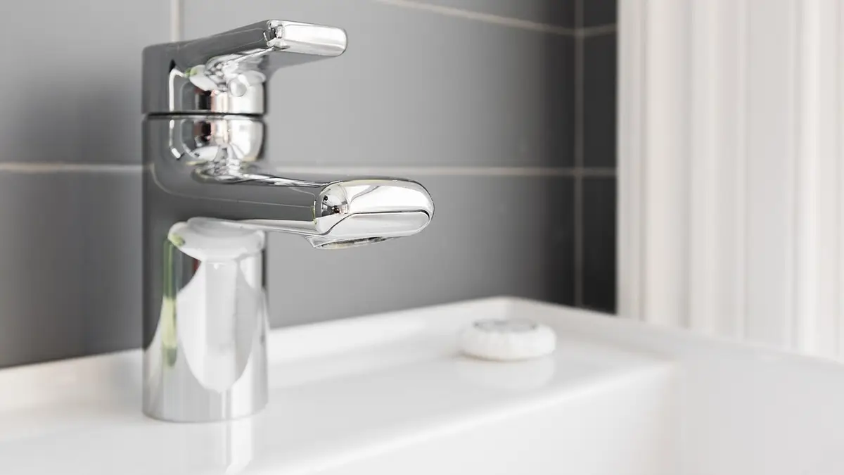 A bathroom sink and faucet.