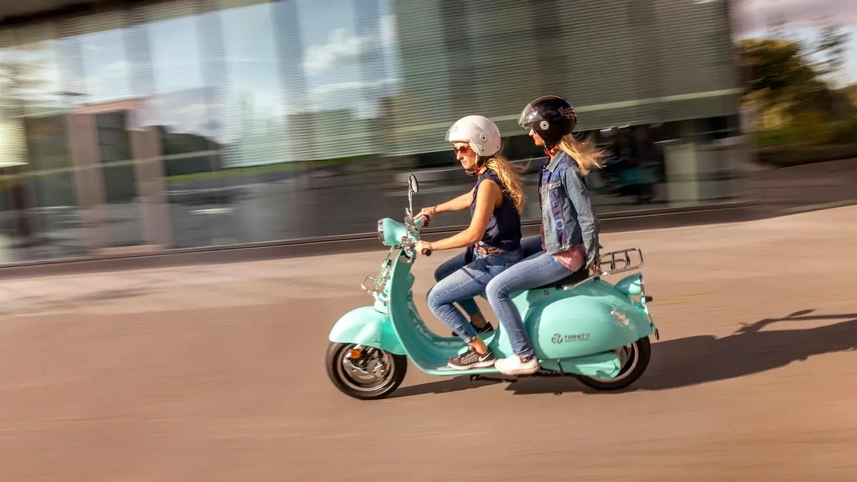 An electric scooter with a battery pack.