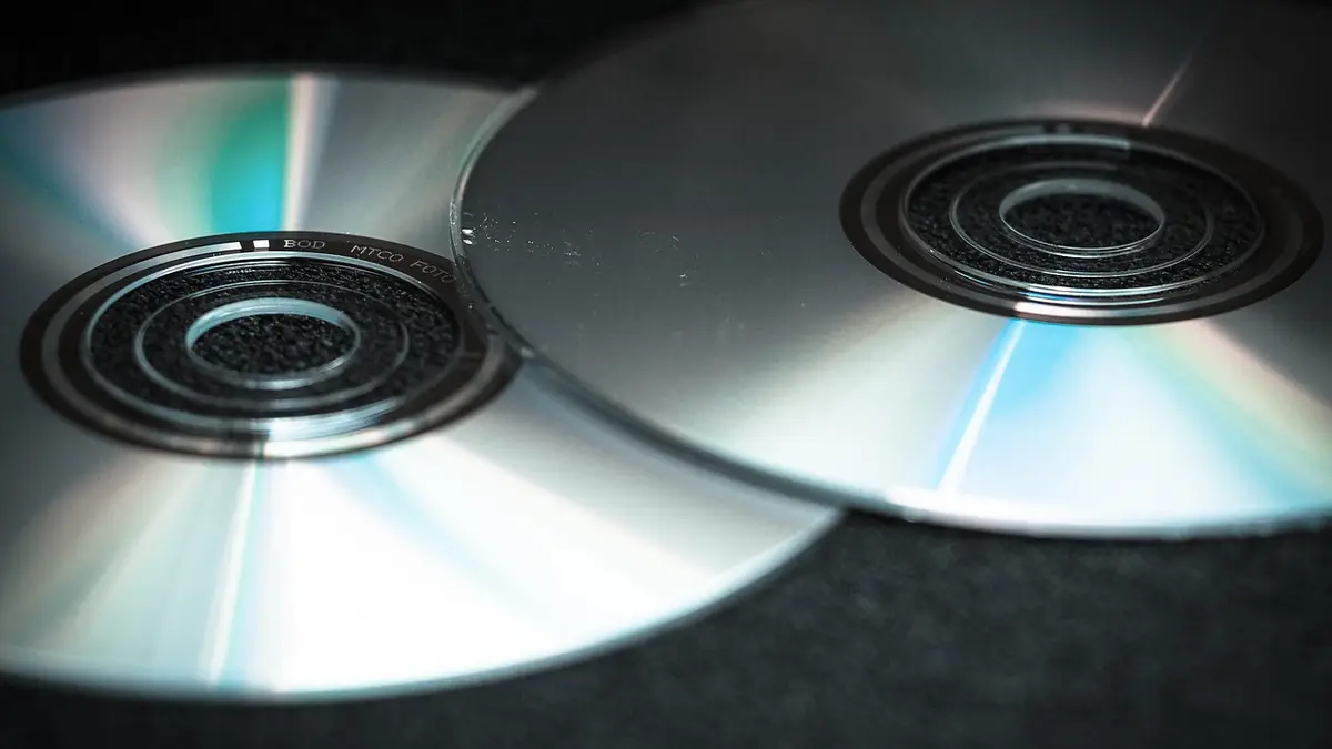 A silver blank optical disc for storing digital data.