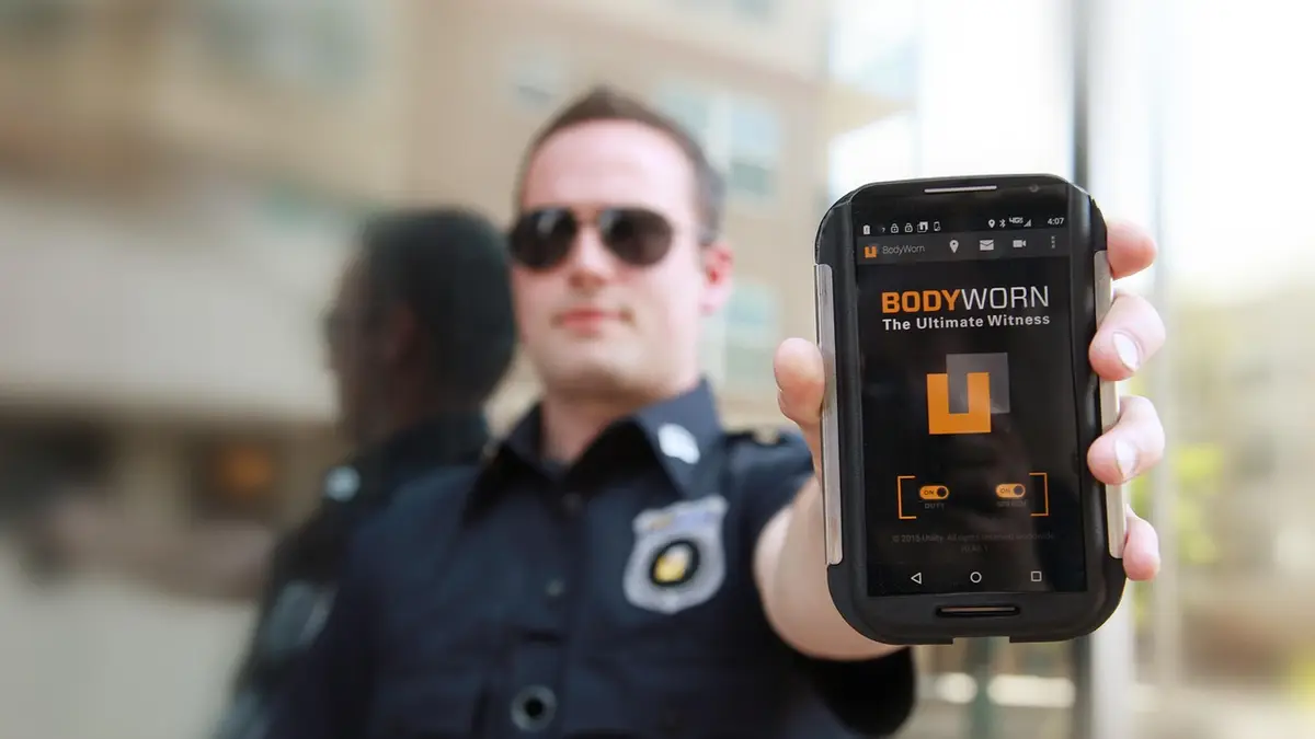 A police officer wearing a body camera.
