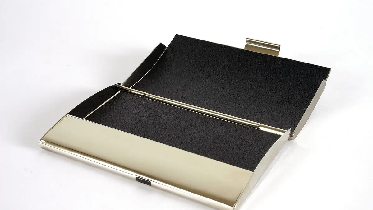A business card holder containing business cards.