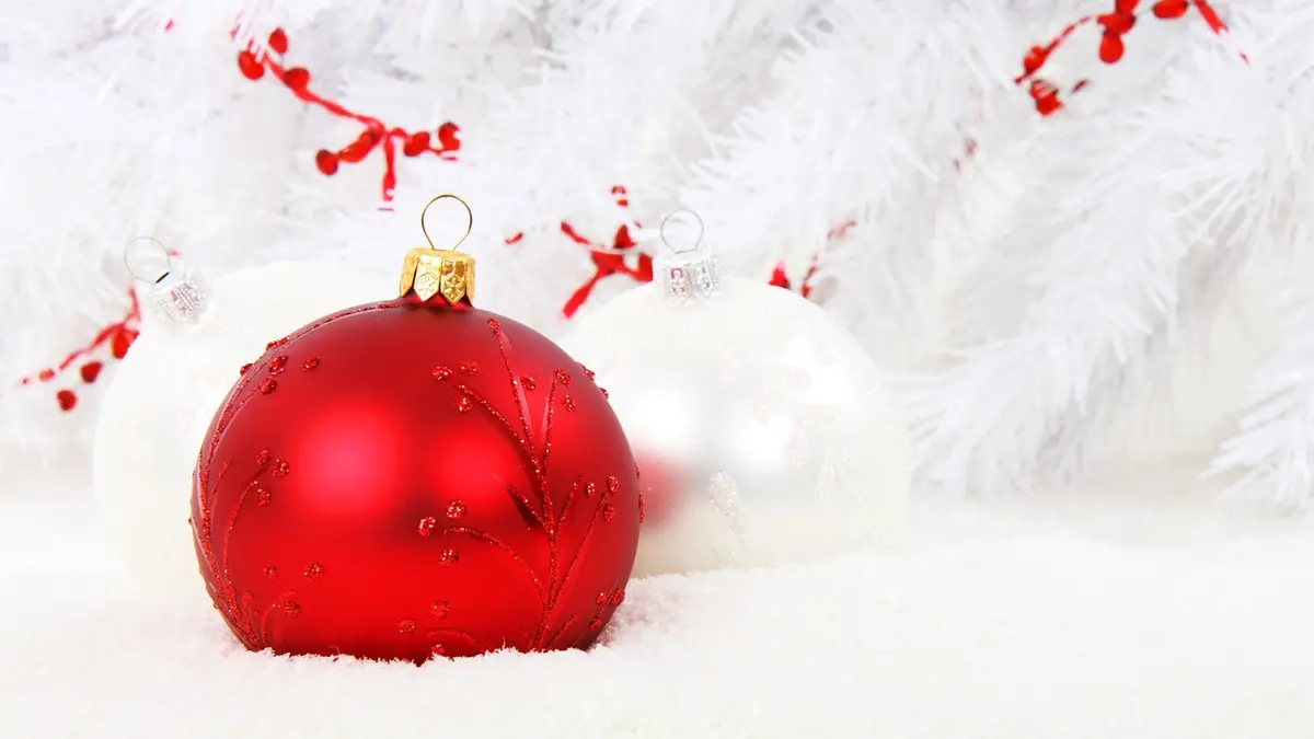 A red glass Christmas bauble.