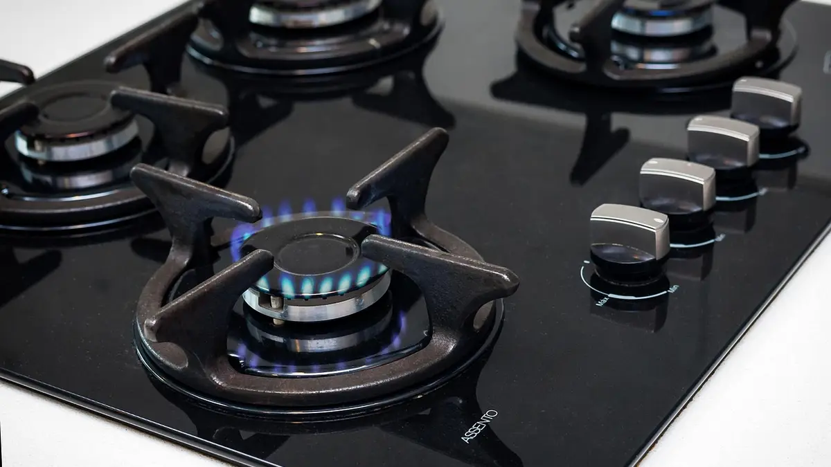 A gas stove in a kitchen.