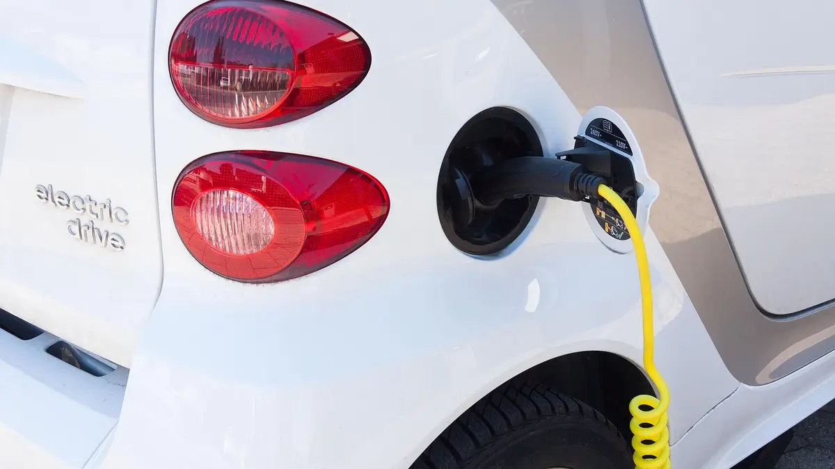 Charging cable plugged into an electric car