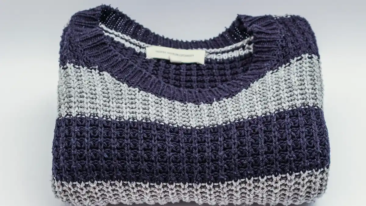 A men's knitted wool sweater.