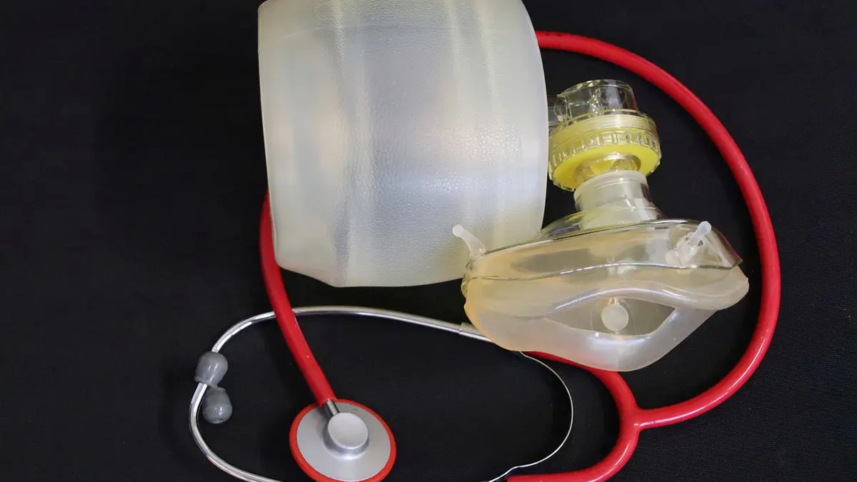 A ventilation mask, resuscitator and stethoscope.