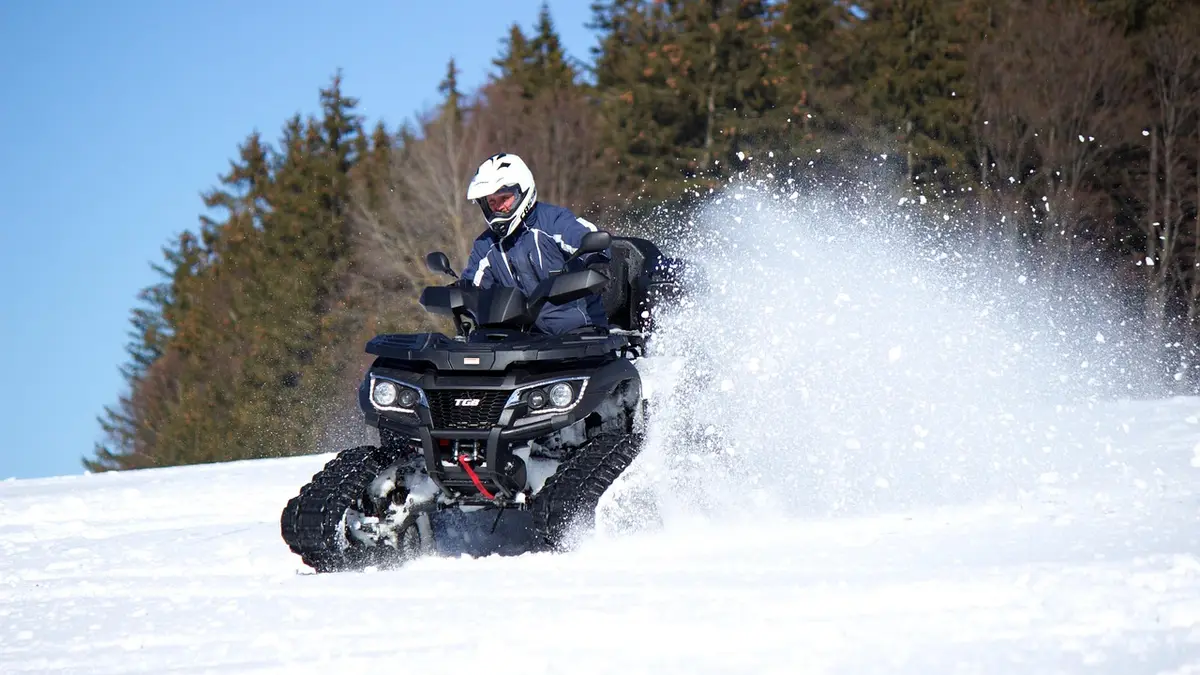 A quad bike on off-road terrain.