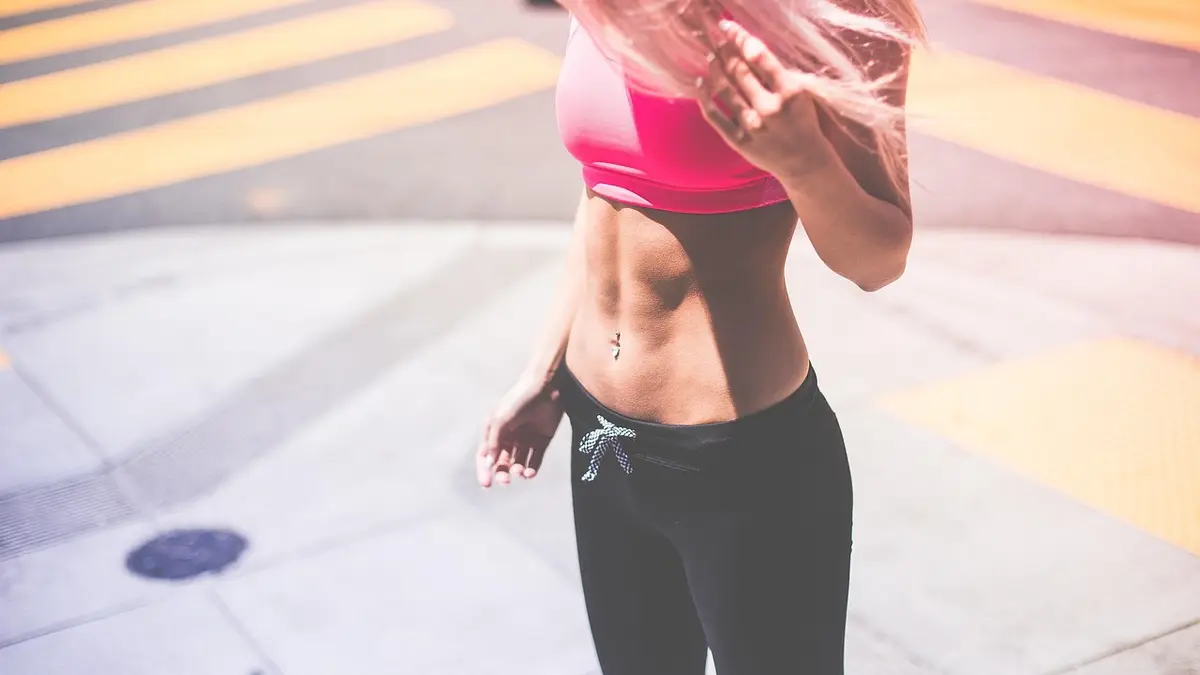 A woman wearing a sports bra.