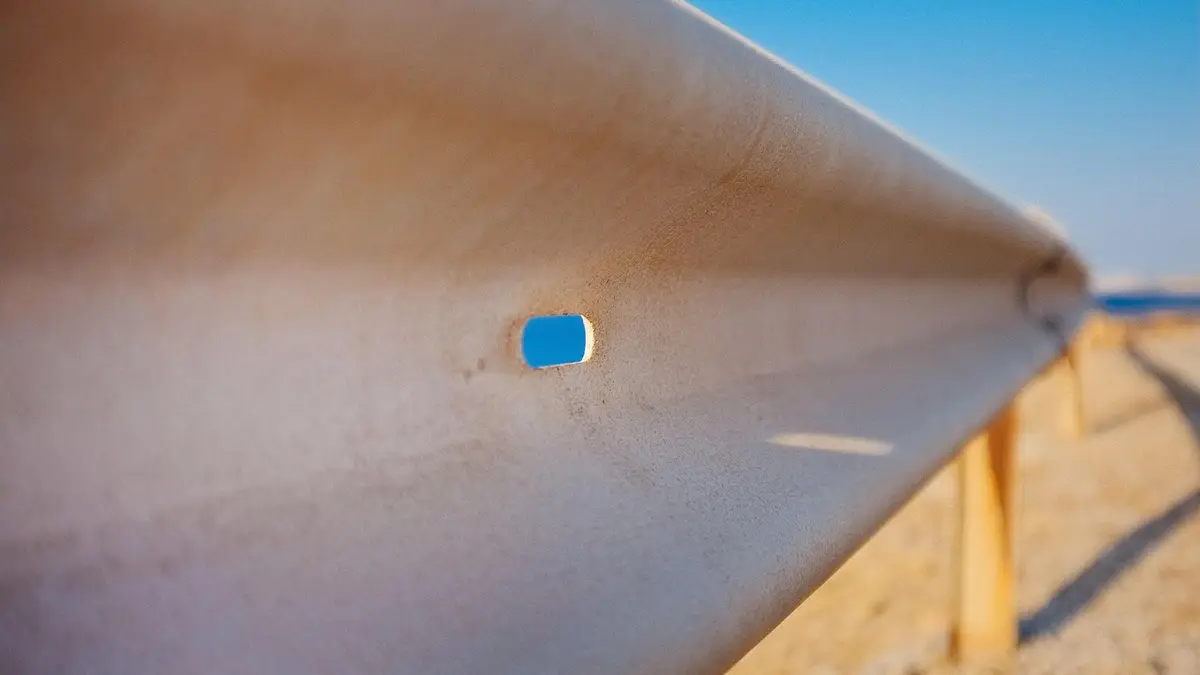 A steel guardrail beside a road.
