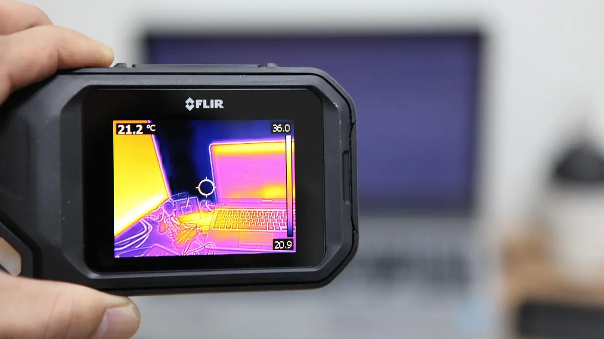 A thermal imaging camera and a laptop.
