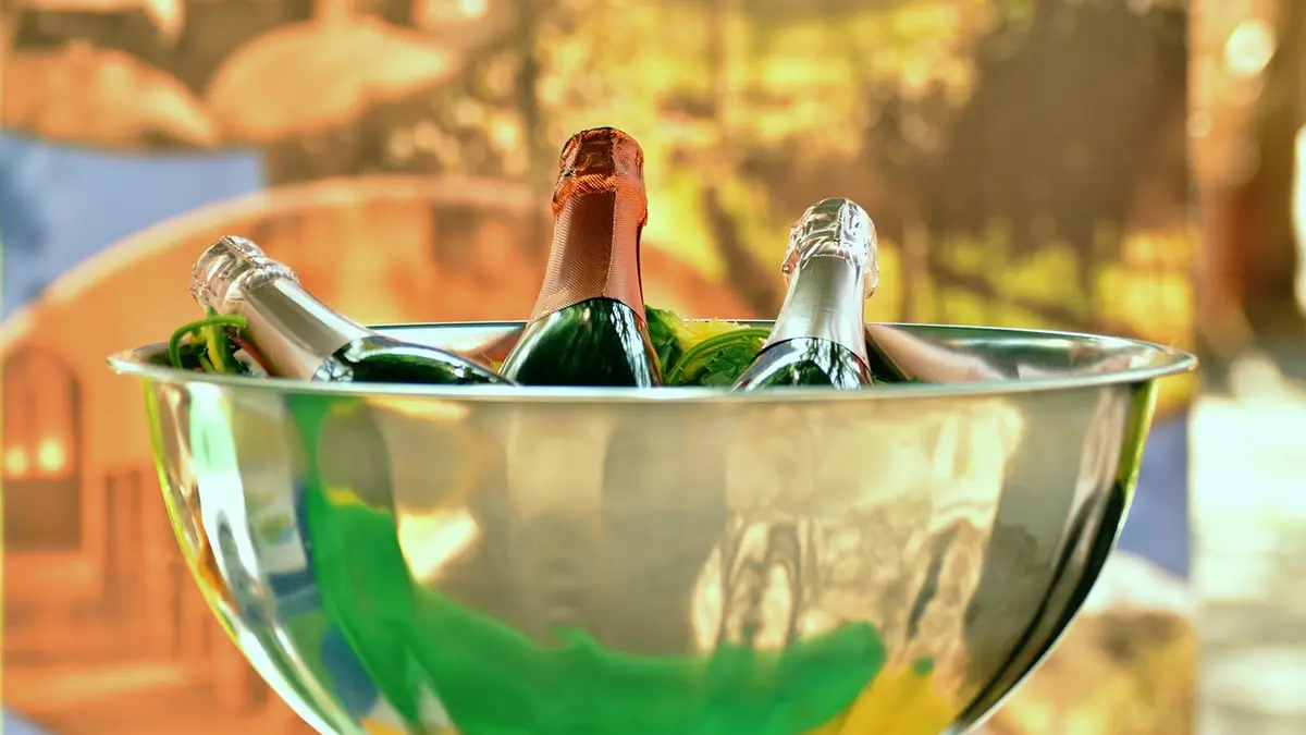 Champagne bottles and a champagne cooler.