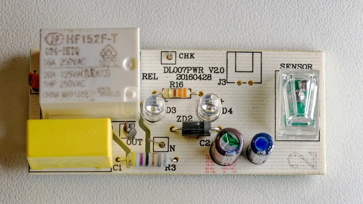 Electronic components including a diode, capacitor, relay and resistor.